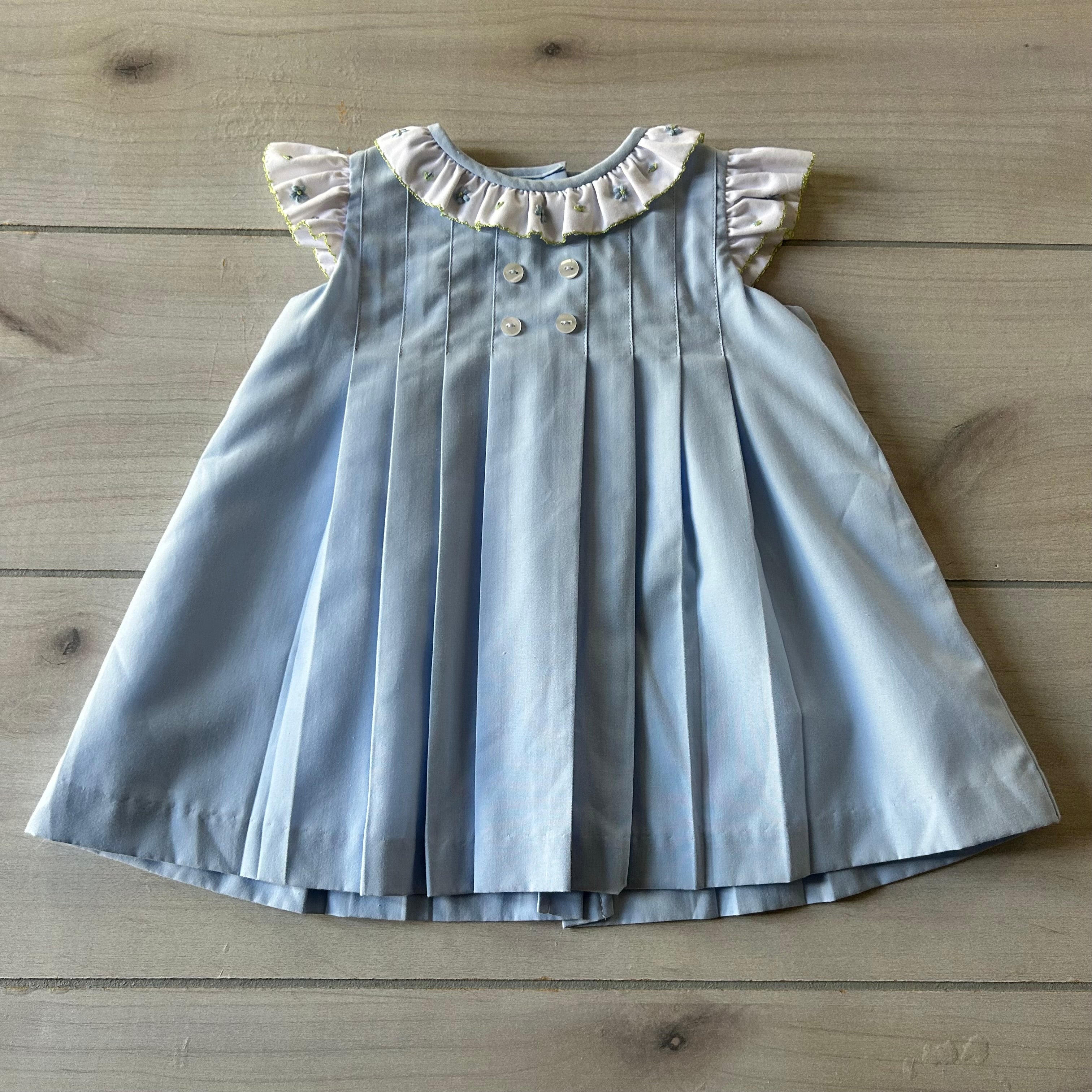 The Proper Peony Blue Floral Embroidered Pleated Dress Sweet Pea & Teddy The Proper Peony Blue Floral Embroidered Pleated Dress Sweet Pea & Teddy